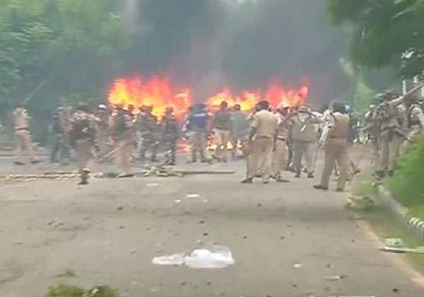 Rioters have set many trains and petrol pumps on fire.
